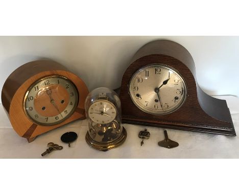 Smiths walnut cased mantle clock, oak Napoleon hat clock and a Schatz dome cased Anniversary clock. 
