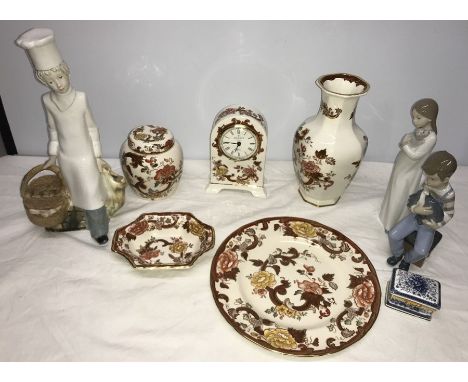 Five pieces Masons brown velvet including clock, plate, vase, ginger jar, two Nao figures, Staffordshire box and chef figure.