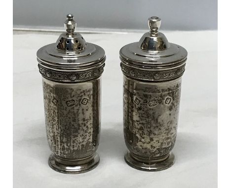 Hallmarked silver salt and pepper pots. R.S. Birmingham 1979, approx 69.6 gms total. 
