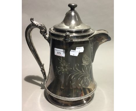 A large silver plated ceramic lined jug, Made in America