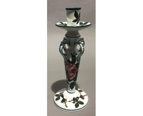 A Wemyss Ware chamber/candlestick, typically decorated, impressed mark to base and printed Thomas Goode &amp; Co. mark