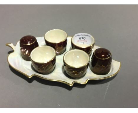 A Carlton Ware Rouge Royale egg cup cruet stand