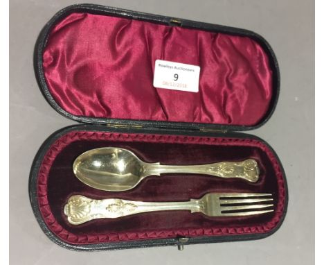 A cased silver spoon and fork