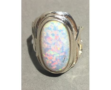 A silver and opal ring