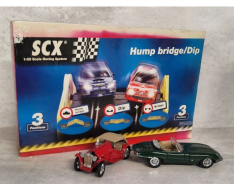 A Tecni Toys SCX 1/32 scale Hump Bridge/Dip set, 3 positions, instructions &amp; original box;&nbsp;a Franklin Mint 1948 MG T