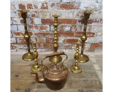 A pair of substantial ecclesiastical brass candlesticks 53.5cms high; a smaller pair of brass ejector candlesticks stamped 'T