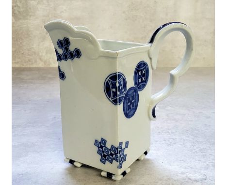 A Royal Worcester Aesthetic Movement square-section cream jug,&nbsp;gros bleu scroll handle, inverted pyramidical feet, 12cm 