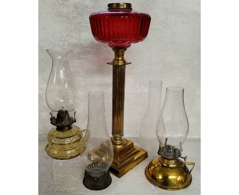 Victorian oil lamp base with cranberry glass reservoir, other oil lanterns, etc 