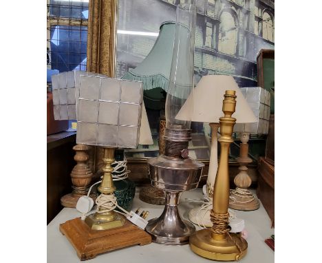 Various vintage table lamps including an Aladdin oil lantern; a converted brass candlestick mounted on a wooden plinth (7) 