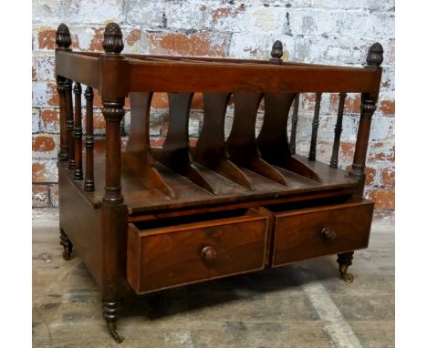 An early 19th century Regency rosewood Canterbury, two short drawers to base with six section rack raised on bobbin turned le