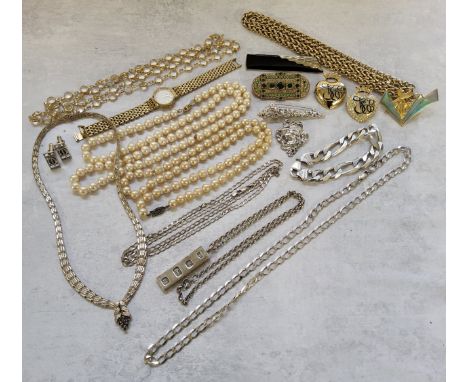 A silver ingot pendant , SJC, Sheffield, 1976 &amp; silver belcher chain; an Italian silver diamond cut curb bracelet; a silv
