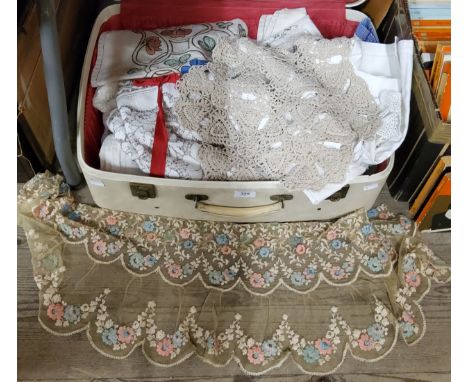 Linen &amp; lace including an embroided Edwardian lace shawl; table cloths etc, housed in a vintage suitcase. 