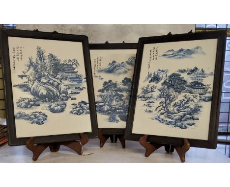 Oriental Ceramics&nbsp; - A Chinese blue and white decorated porcelain triptych in hardwood wall hanging frames. Each panel d