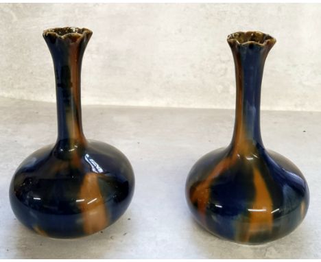 A pair of Art Nouveau globe &amp; stem spilll vases, drip glazed in colbalt blue &amp; ochre 15cms high (2) 