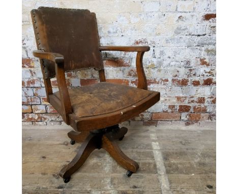 A Globe Wernicke Co, London banker's chair, adjustable settings, raised on castors.&nbsp; Total dimensions height 92.5cm x wi