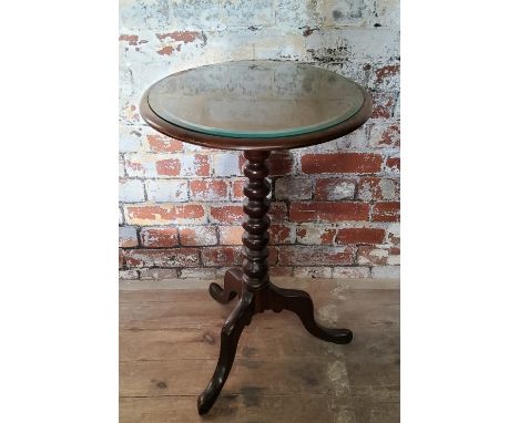 A late Victorian mahogany one piece dished top circular occasional/wine table, bobbin turned column and tripod supports c.190