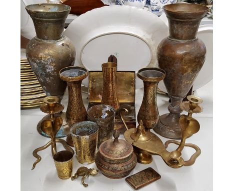 Metalware - a pair of Middle Eastern brass candlesticks in the form of King cobra snakes; oil lamp, heavily chased box, frog,