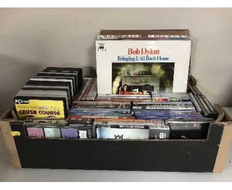 A box of LP records and DVDs - Bob Dylan, The Beatles etc 