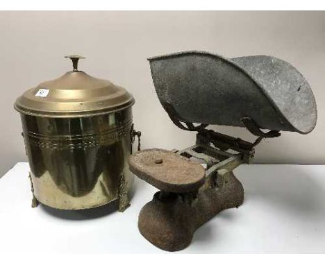 An antique set of weighing scales together with a brass coal receiver containing coal