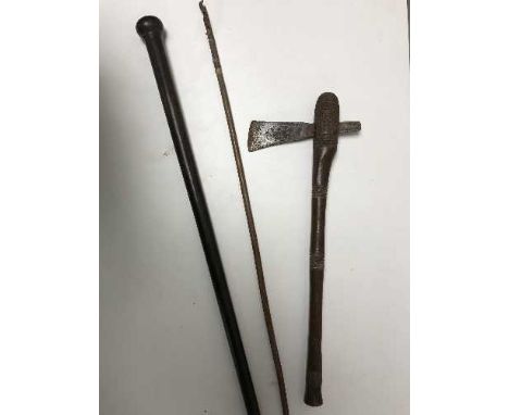 A knobkerry together with a tribal axe and arrow shaft (3)