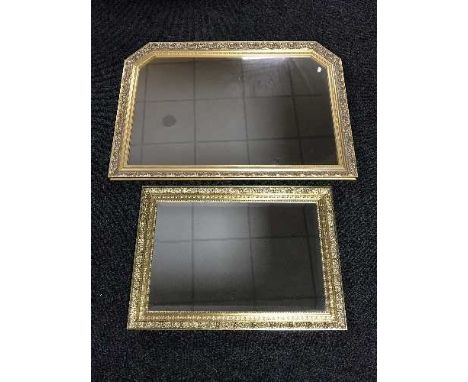 A gilt framed over mantel and a gilt framed mirror 