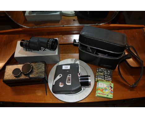 A zooming monocular and vintage cine camera, and four 8mm home movies to include Mickey Mouse and Charlie Chaplin