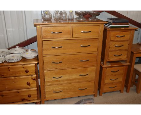 A light oak chest fitted two short over four long drawers 