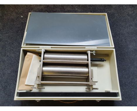 A model 2412 Etching Press, to include original instructions and carrying case.