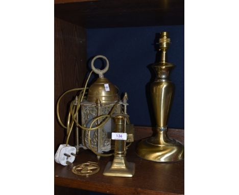 A mixed lot of brass including table lamp, isle of man horse brass,candle stick and ceiling light.
Lead removed