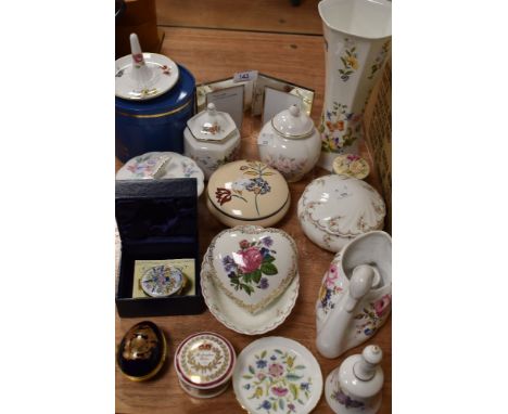 An assortment of trinket dishes, vases , frames and more.
