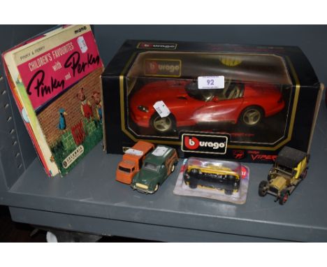 A boxed Burago car,and similar including Corgi an matchbox also included are a selection of children's vinyl singles.