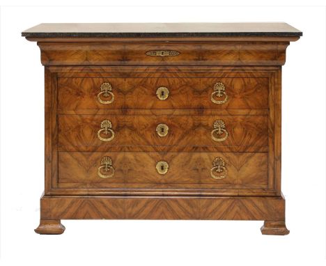 A Louis Philippe figured walnut commode, the associated marble top above a mould frieze drawer and three further drawers, eac
