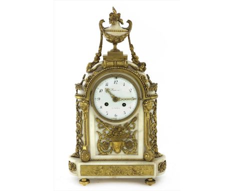 A French marble and ormolu eight-day mantel clock , 19th century, the enamel dial set with Arabic numerals and inscribed 'Man