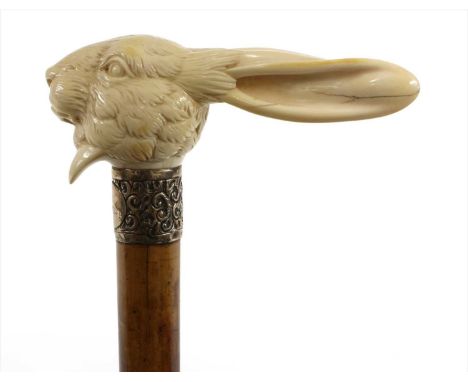 A carved ivory hare mask walking stick , late 19th century, the mount inscribed 'R.G. Laney' on a malacca shaft, 86cm long