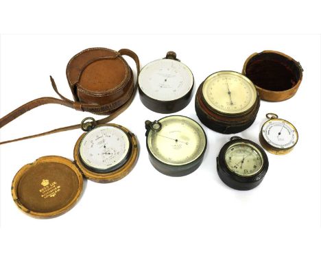 Six 'pocket' aneroids, the first by F Barker &amp; Son, London, the second a surveying aneroid and barometer, the third by Jo