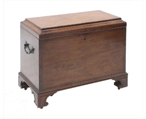 A George III mahogany cellaret, the caddy top with ebony and boxwood stringing, brass handle to either side and on shaped and