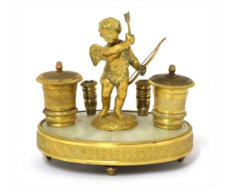 A French gilt metal and mother-of-pearl Palais-Royale-type inkstand , early 19th century, surmounted by a figure of cupid set