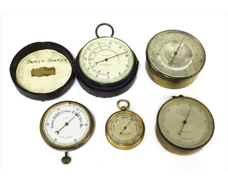 Four pocket aneroid barometers and an altimeter, the first by J A S Pitkin, maker, London 5.58, with curved thermometer, the 