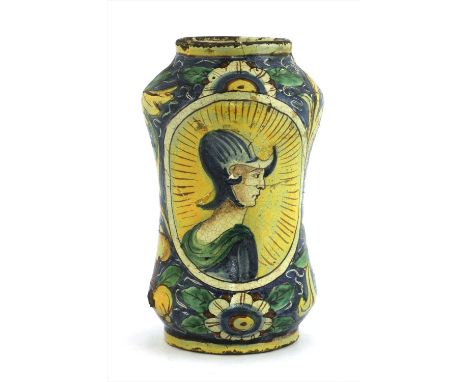 An Italian majolica albarello jar, 17th century, with a central centurion decorated reserve within a scrolling leaf and flowe