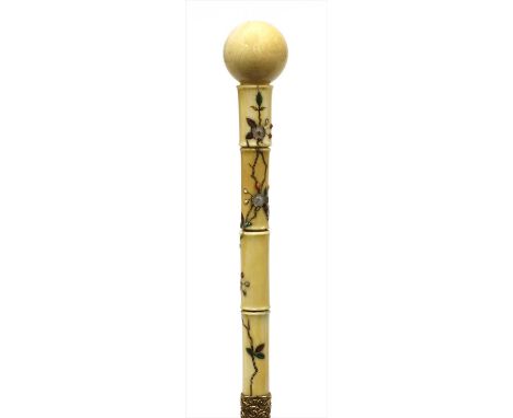 A carved ivory Shibayama walking stick , late 19th century, the turned handle with a ball finial, the shaft inlaid with folia