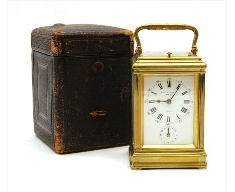 A brass carriage clock, early 20th century, by Charles Frodsham &amp; Co., Paris, the silvered dial inscribed and numbered '1