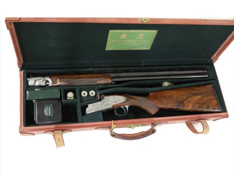 Holland &amp; Holland, 'The Sporting Model', a 12-bore single trigger over and under ejector shotgun, 28in nitro proof barrel