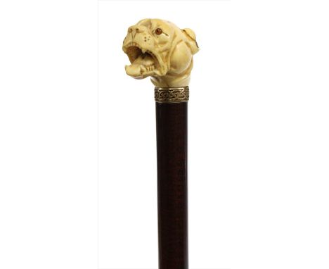 A carved ivory dog's head walking stick, the handle 19th century, possibly a French mastiff, with glass eyes and open mouth, 