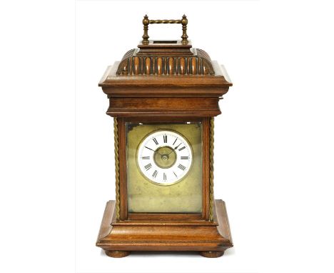 A musical symphonium mantel clock, late 19th century, probably Junghans, a four-glass case with hinged top revealing a disc p
