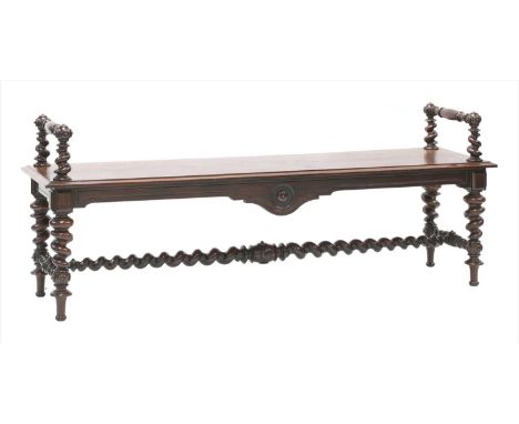 An early Victorian country house oak hall bench, with turned ends, the stepped seat raised on spirally turned supports united