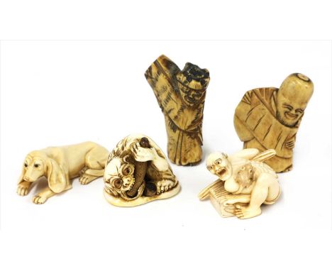 Five various Japanese bone and ivory netsukes, early 20th century, comprising: a crouching monkey-type figure gnawing on a st