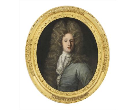 Circle of Sir Godfrey Kneller (1646-1723) PORTRAIT OF EDMUND TALBOT, SON OF ROGER TALBOT (1619-1680), HALF LENGTH, WEARING A 