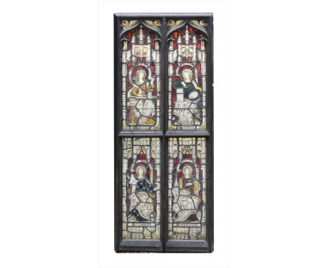 An Arts and Crafts stained and leaded glass panel, mid-late 19th century, in four sections, each decorated with figures, 'Por