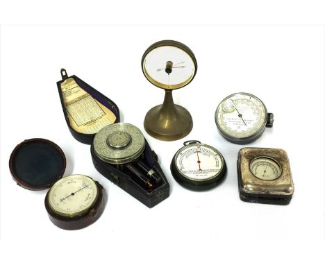 Six aneroid barometers , the first by Goldschmid, Zurich, No.421 with altimeter and paper chart, in leather case, the second 