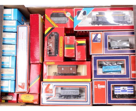 A large tray containing approx. 40 boxed 00-gauge goods wagons by Hornby, Lima, Airfix. (VG-E) (BG-E)